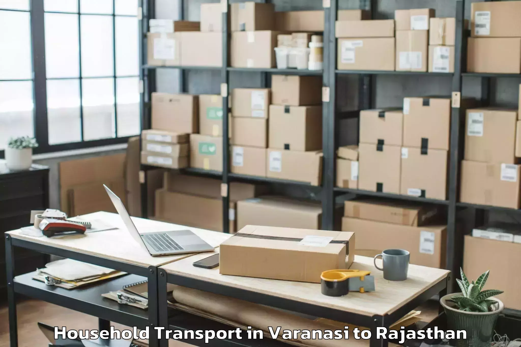 Varanasi to Kherwara Household Transport Booking